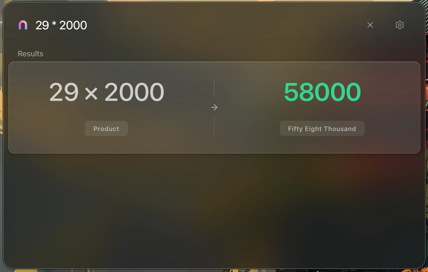 Nimix calculator showing 29 times 2000 equals 58000, written as Fifty Eight Thousand