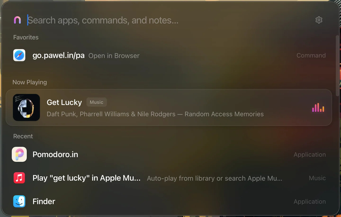Nimix command bar centered on a MacBook Pro with Japanese landscape wallpaper